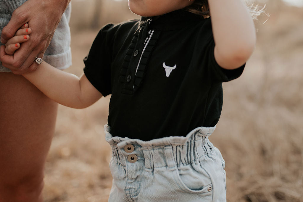 Little Windmill Clothing co. "stormy" Black and White Gingham Ruffle Contrast Polo