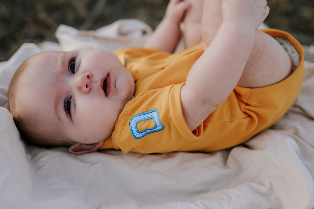 Little Windmill Clothing Co. "Danny Baby" Golden Baby Polo Romper